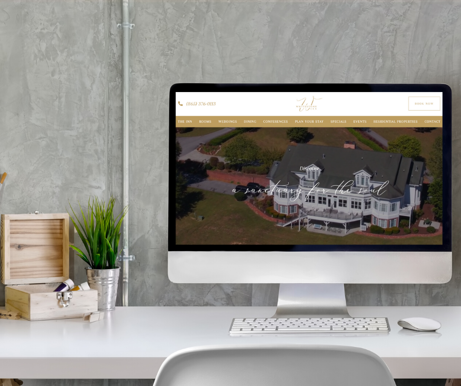 New Whitestone Inn website homepage on a desktop computer